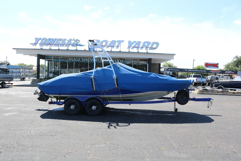 Slide: The Image of 2007 Tahoe Q6 SF boat with blue cover at Yowell's Boat Yard. - 13