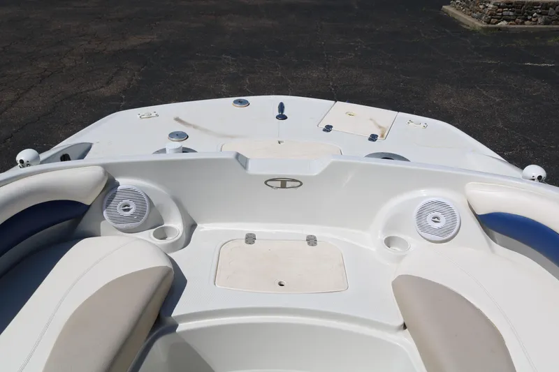Slide: The Image of 2007 Tahoe Q6 SF boat interior with seating and speakers. - 23