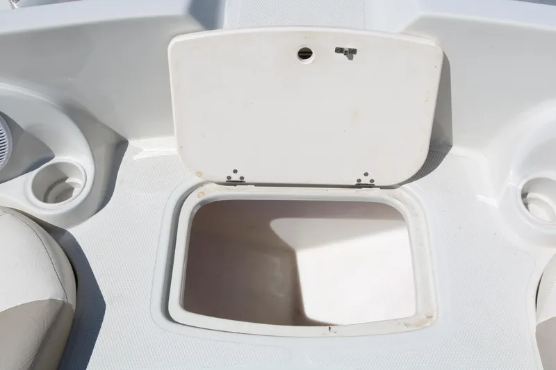 Slide: The Image of Open storage compartment on a 2007 Tahoe Q6 SF boat. - 28