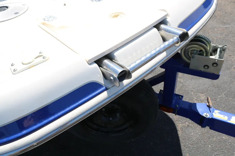 Slide: The Image of Close-up of a 2007 Tahoe Q6 SF boat on a trailer. - 3