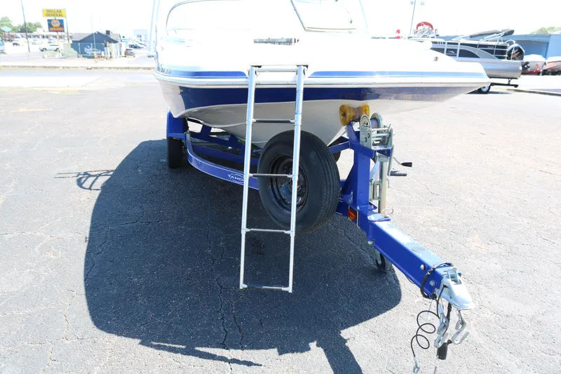 Slide: The Image of 2007 Tahoe Q6 SF boat on trailer with ladder. - 4