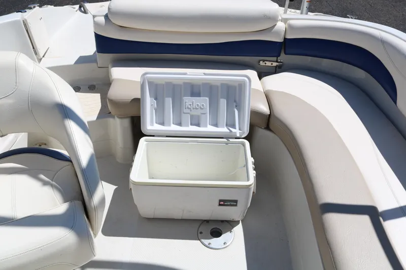 Slide: The Image of 2007 Tahoe Q6 SF boat interior with open Igloo cooler on seating area. - 42