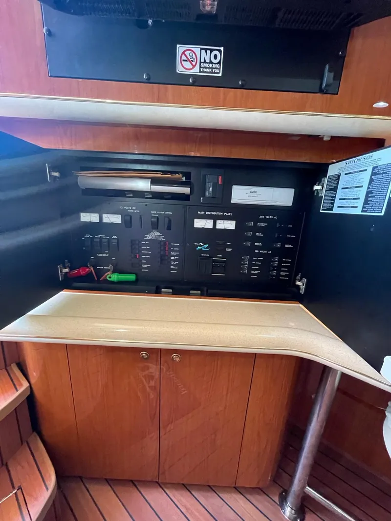 Slide: The Image of Electrical control panel inside a 2000 Sea Ray 450 Express Bridge yacht. - 15