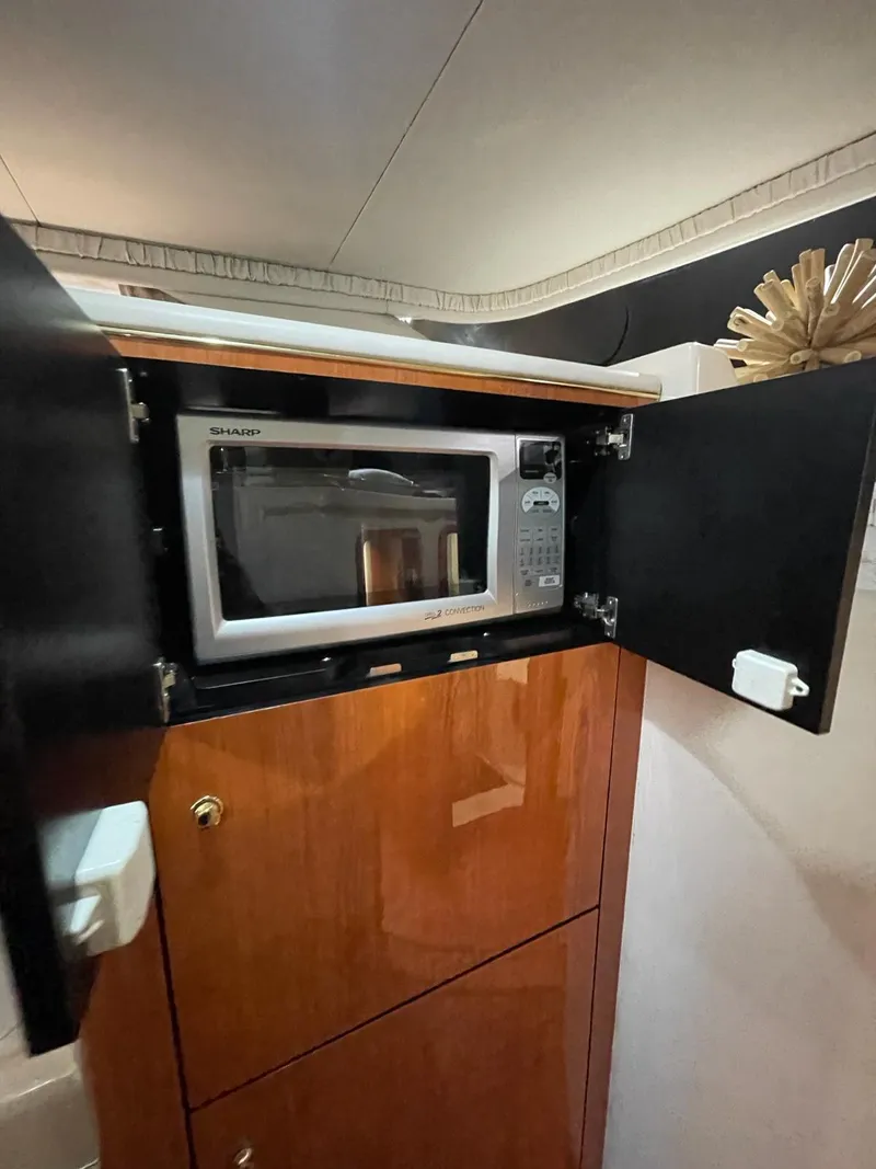 Slide: The Image of Microwave in the kitchen of a 2000 Sea Ray 450 Express Bridge yacht. - 19