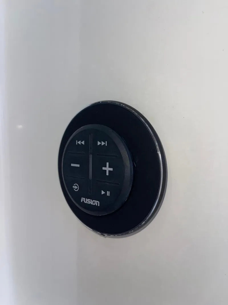 Slide: The Image of Fusion audio control panel on 2000 Sea Ray 450 Express Bridge yacht. - 23