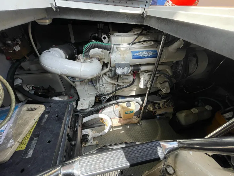 Slide: The Image of Engine compartment of a 2000 Sea Ray 450 Express Bridge boat. - 26