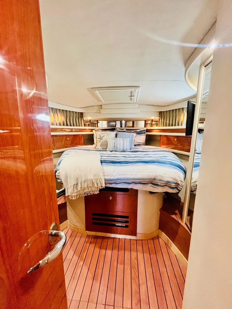 Slide: The Image of Luxurious bedroom interior of 2000 Sea Ray 450 Express Bridge yacht. - 29