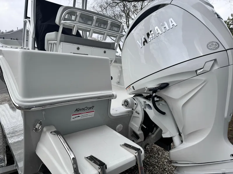 Slide: The Image of 2024 KenCraft 21 Center Console boat with Yamaha outboard motor. - 3