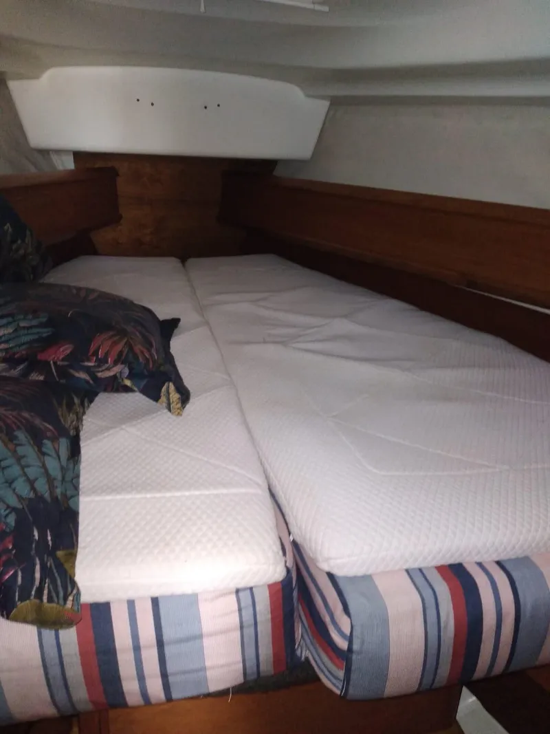 Slide: The Image of Cabin of Jeanneau Sun Odyssey 40.3, 2005 model, featuring a double bed. - 17
