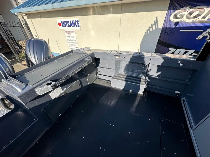 Slide: The Image of 2024 Duckworth 26 Offshore boat interior with dual engines, spacious deck, and modern design. - 14