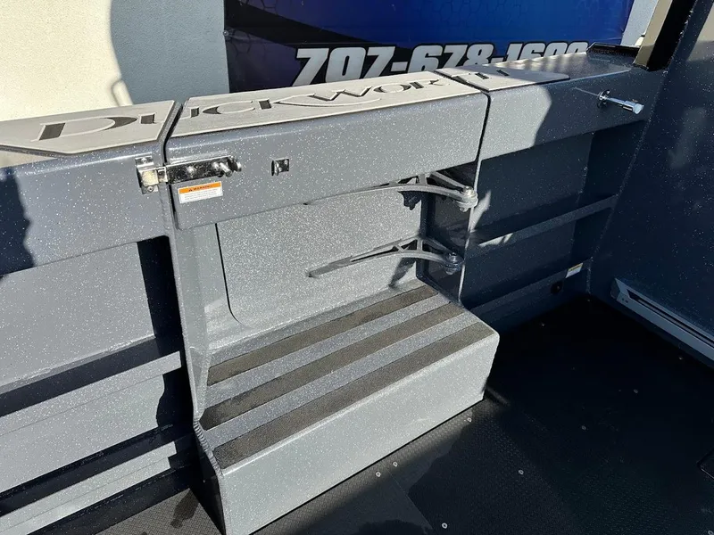 Slide: The Image of 2024 Duckworth 26 Offshore boat interior with step and storage compartment. - 18