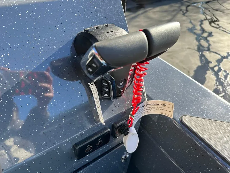 Slide: The Image of Throttle control of 2024 Duckworth 26 Offshore boat with safety lanyard. - 23