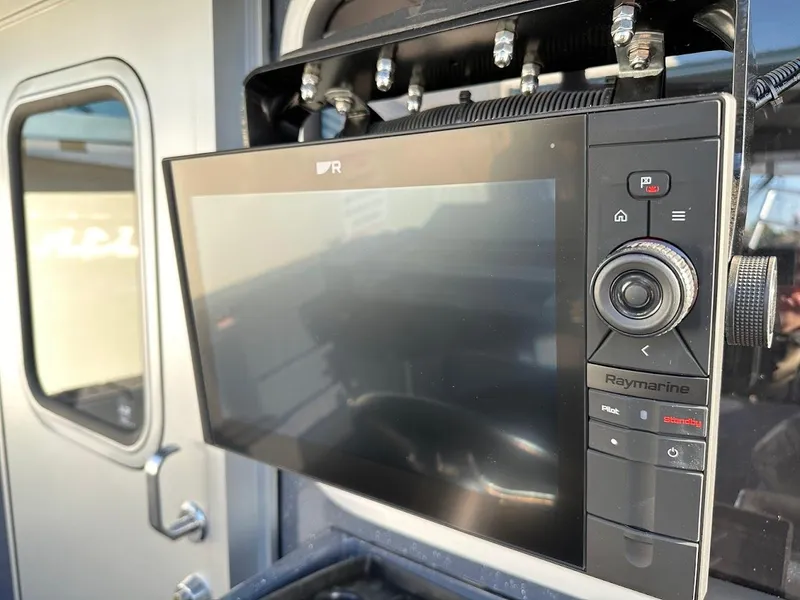 Slide: The Image of Raymarine navigation system on 2024 Duckworth 26 Offshore boat. - 24