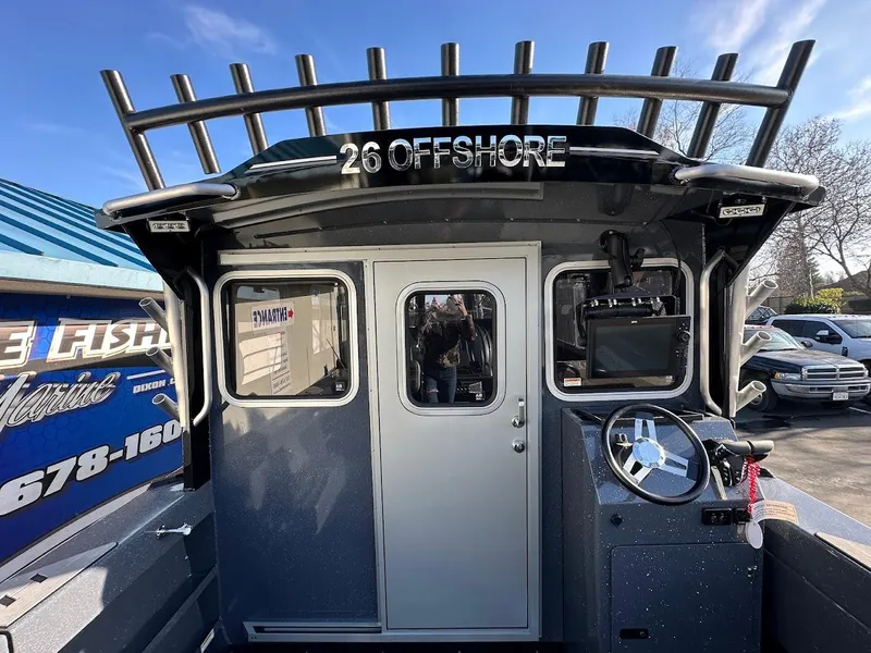 Slide: The Image of 2024 Duckworth 26 Offshore boat with cabin and navigation equipment. - 25