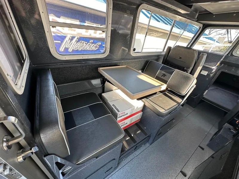 Slide: The Image of Interior of 2024 Duckworth 26 Offshore boat with seating and table. - 28