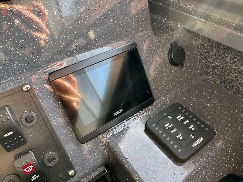 Slide: The Image of Dashboard of 2024 Duckworth 26 Offshore boat with Yamaha display and controls. - 37