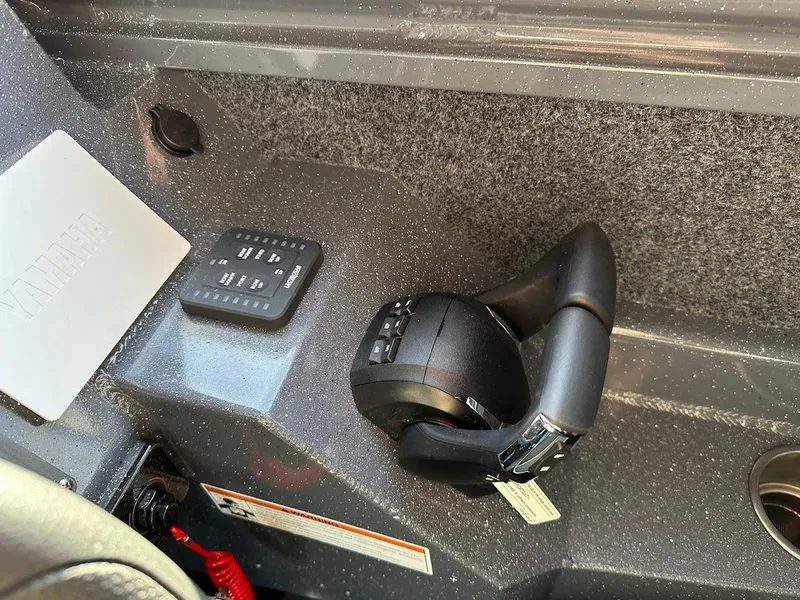 Slide: The Image of Control panel of 2024 Duckworth 26 Offshore boat with throttle lever. - 38