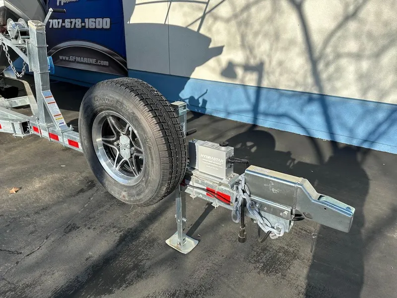 Slide: The Image of Trailer hitch and spare tire for 2024 Duckworth 26 Offshore boat. - 4
