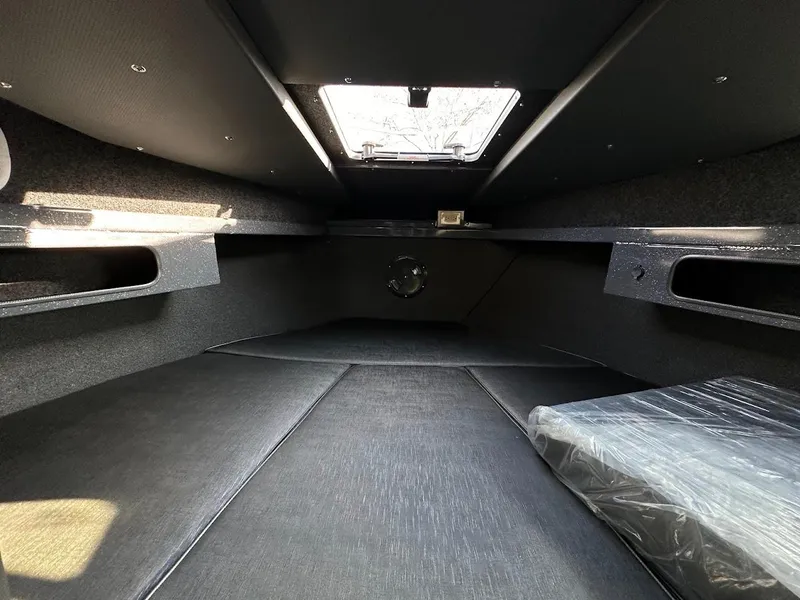 Slide: The Image of 2024 Duckworth 26 Offshore cabin interior with sleek design and ample space. - 43