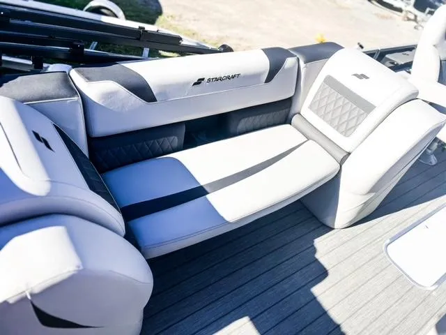 Slide: The Image of 2024 Starcraft CX 23 FD boat interior with luxurious seating. - 15