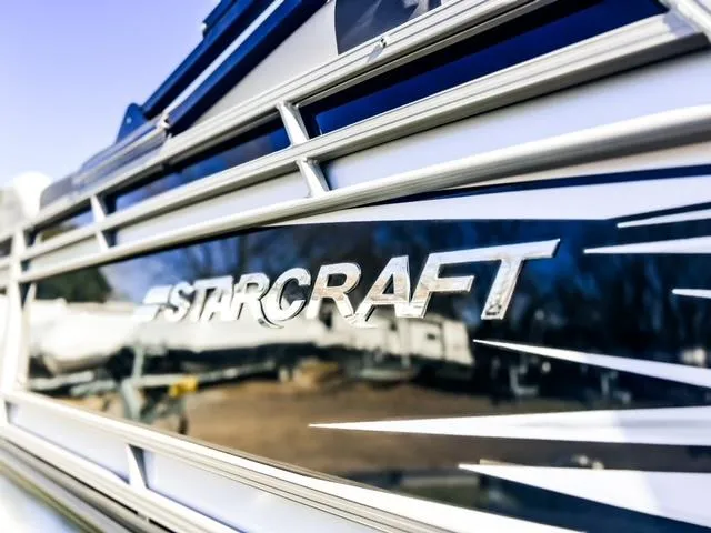 Slide: The Image of Close-up of 2024 Starcraft CX 23 FD boat logo. - 18