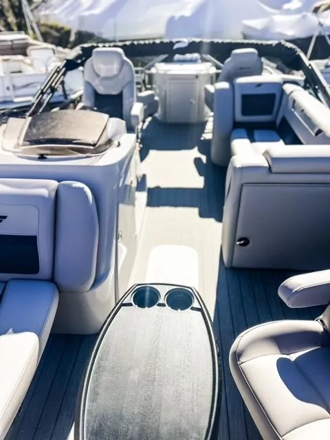 Slide: The Image of 2024 Starcraft CX 23 FD boat interior with luxurious seating and modern amenities. - 6
