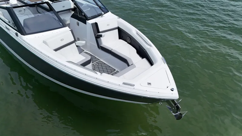Slide: The Image of 2024 Cobalt R8 Outboard boat on water, featuring sleek design and spacious seating. - 5