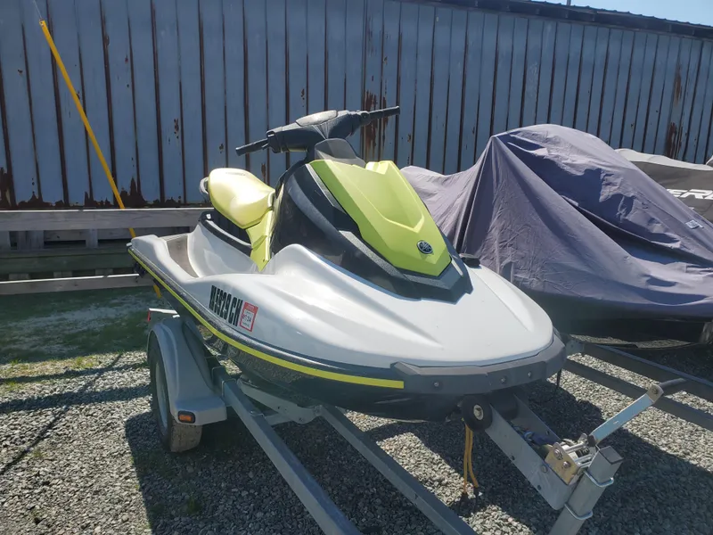 Slide: The Image of 2019 Yamaha WaveRunner EX Deluxe on trailer, parked outdoors. - 2