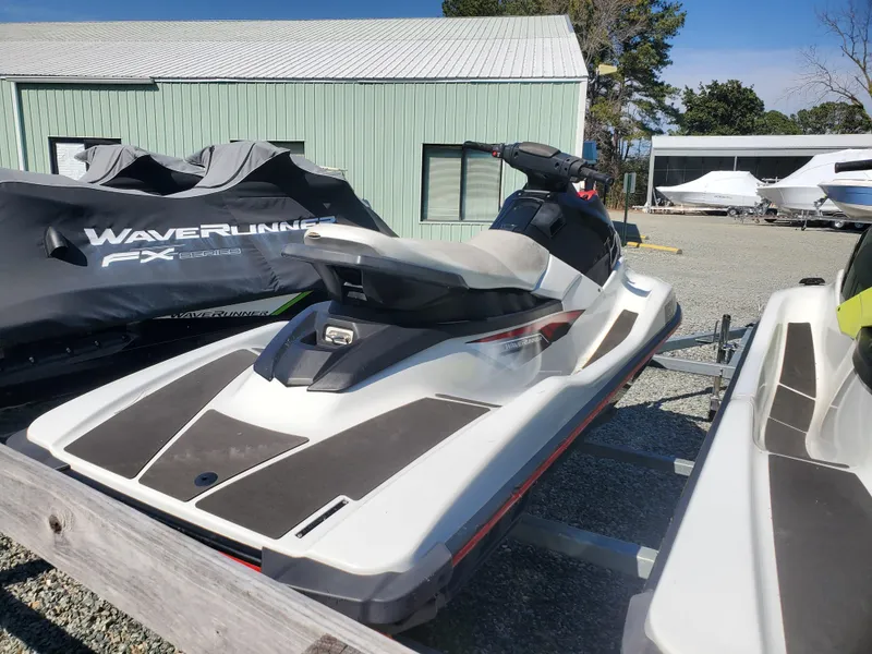 Slide: The Image of 2019 Yamaha WaveRunner EX Deluxe jet ski in storage area. - 3