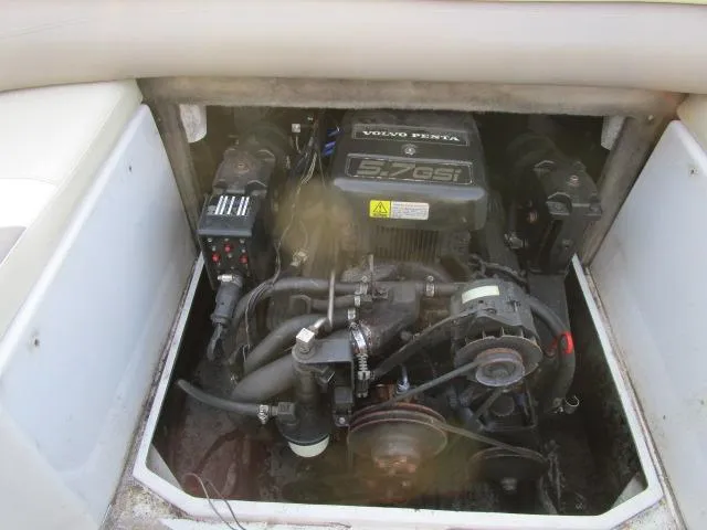 Slide: The Image of 1998 Four Winns 240 Horizon boat engine compartment with Volvo Penta 5.7 GSi engine. - 13