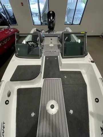 Slide: The Image of 2023 Yar-Craft 209 TFX boat interior with dual consoles and outboard motor. - 14