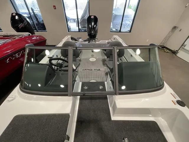 Slide: The Image of 2023 Yar-Craft 209 TFX boat interior with windshield and seating. - 15