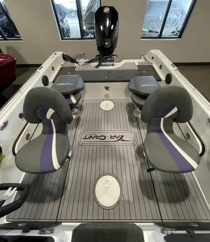 Slide: The Image of 2023 Yar-Craft 209 TFX boat interior with seating and motor. - 16
