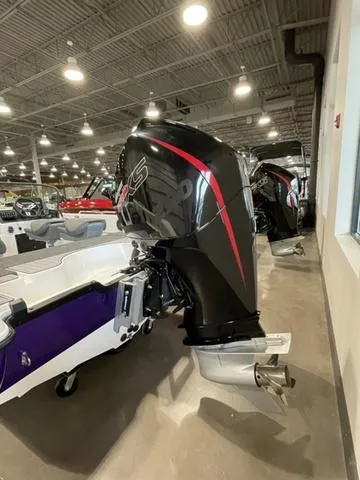 Slide: The Image of 2023 Yar-Craft 209 TFX boat with powerful outboard motor in showroom. - 4