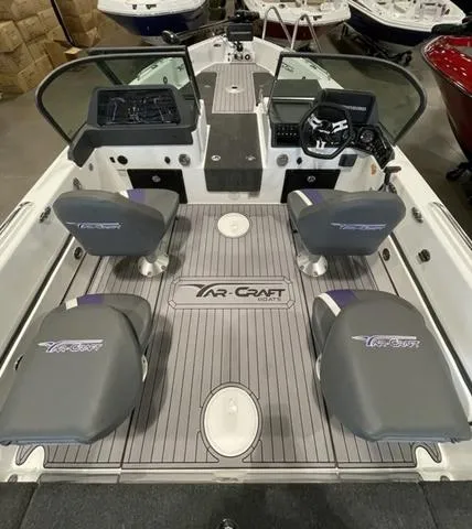 Slide: The Image of 2023 Yar-Craft 209 TFX boat interior with four seats and control panel. - 5