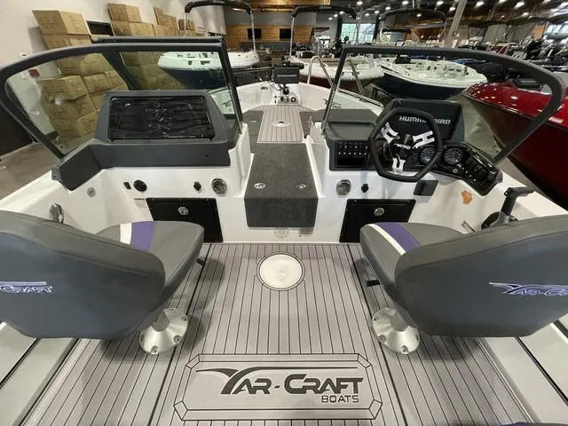 Slide: The Image of 2023 Yar-Craft 209 TFX boat interior with dual seats and control console. - 7