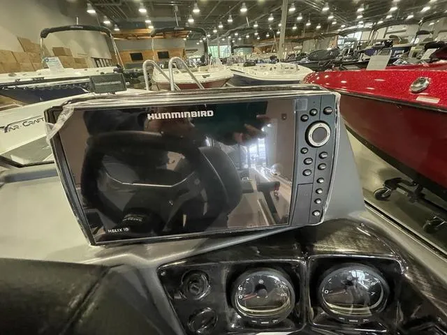 Slide: The Image of 2023 Yar-Craft 209 TFX boat dashboard with Humminbird Helix 10 fishfinder. - 9