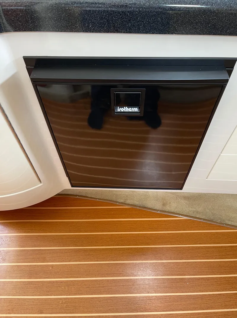 Slide: The Image of Built-in refrigerator in 2006 Monterey 322 Cruiser yacht kitchen. - 13