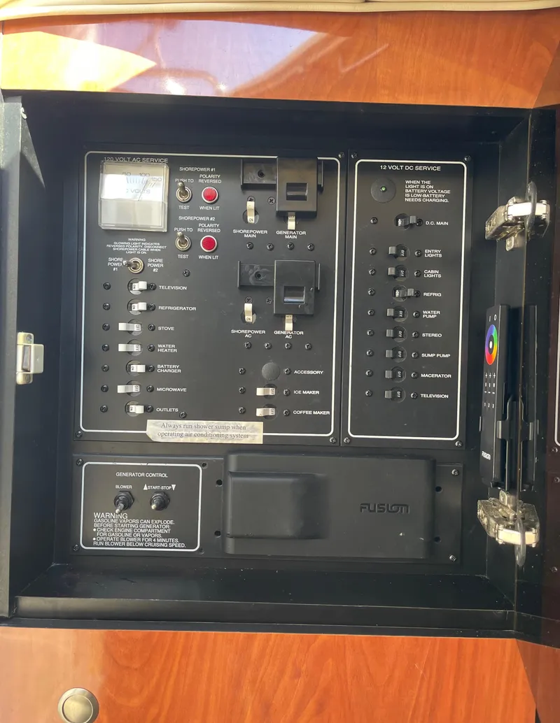 Slide: The Image of Electrical control panel of a 2006 Monterey 322 Cruiser boat. - 15