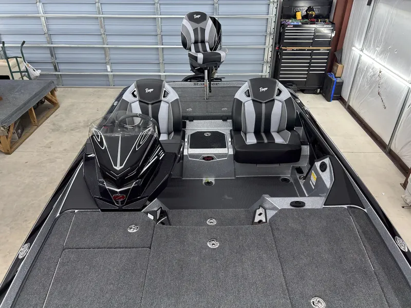 Slide: The Image of 2024 Ranger Z520R Ranger Cup Equipped boat interior in a garage. - 11