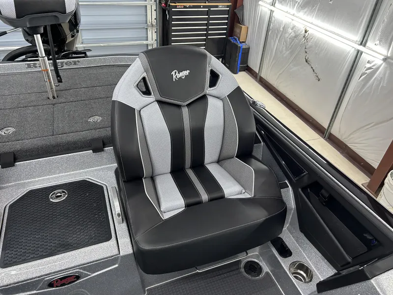 Slide: The Image of 2024 Ranger Z520R Ranger Cup Equipped boat seat in a garage. - 12