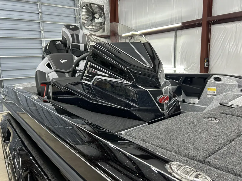 Slide: The Image of 2024 Ranger Z520R Ranger Cup Equipped boat in a storage facility. - 18
