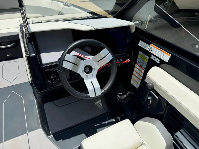 Slide: The Image of 2023 Heyday H-22 boat cockpit with steering wheel and control panel. - 4