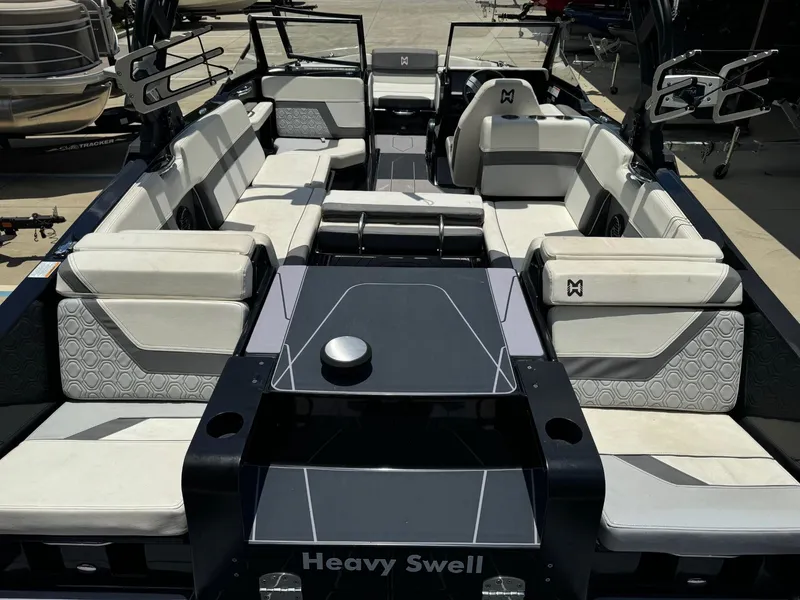 Slide: The Image of 2023 Heyday H-22 boat interior with spacious seating and modern design. - 5