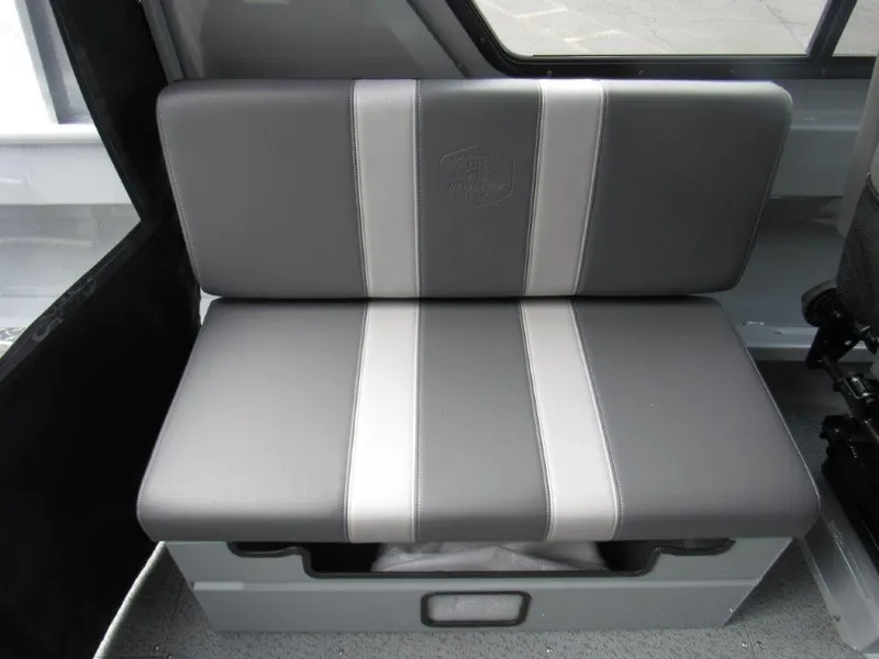 Slide: The Image of 2024 Hewescraft 220 OCEAN PRO HT FC interior seating with gray and white upholstery. - 14