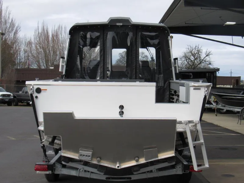 Slide: The Image of 2024 Hewescraft 220 OCEAN PRO HT FC boat rear view on trailer. - 4