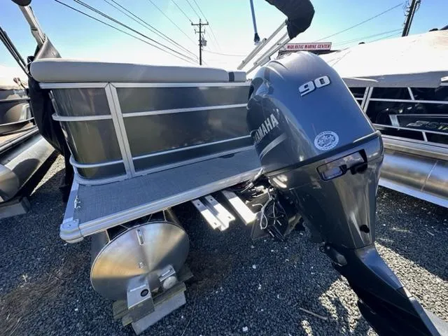 Slide: The Image of 2024 Starcraft EX 20 C pontoon boat with Yamaha 90 outboard motor. - 6