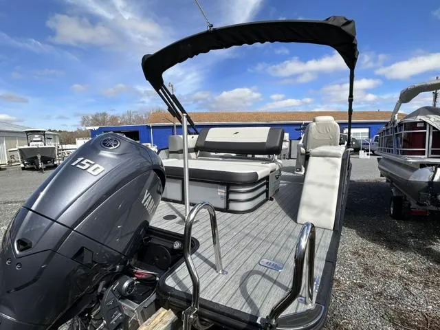 Slide: The Image of 2024 Starcraft EX 20 Q DH pontoon boat with Yamaha 150 engine. - 6