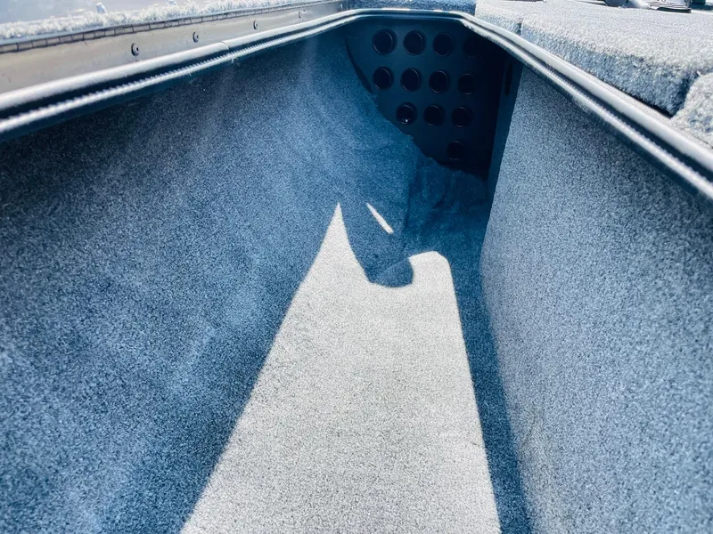 Slide: The Image of 2024 Tracker Pro Team 195 TXW Tournament Edition boat storage compartment. - 15