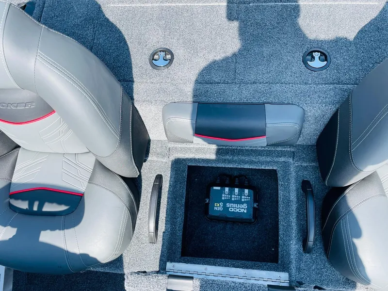 Slide: The Image of 2024 Tracker Pro Team 195 TXW Tournament Edition boat interior with storage compartment. - 34